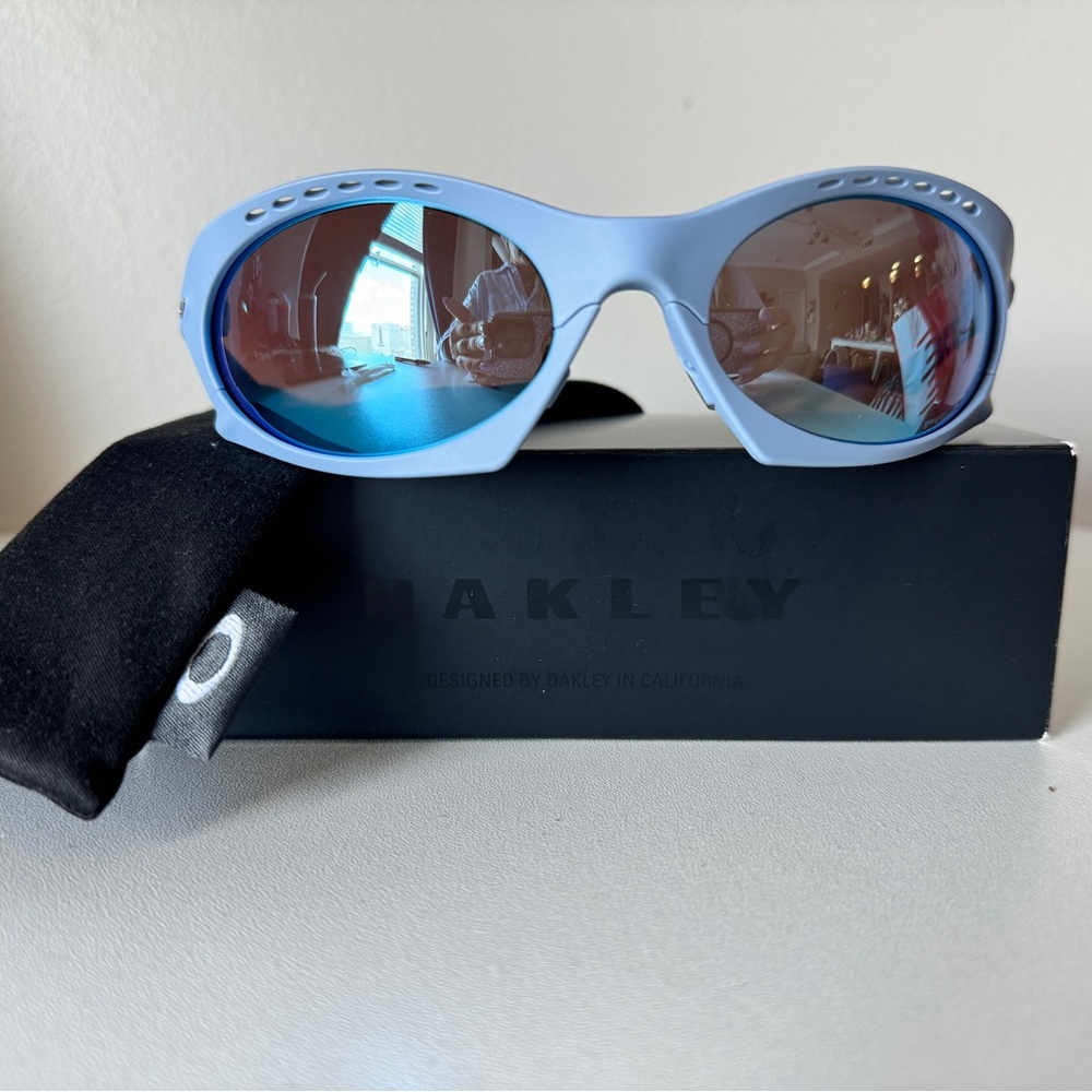 Oakley Sky Blue Sunglasses with Black Pouch